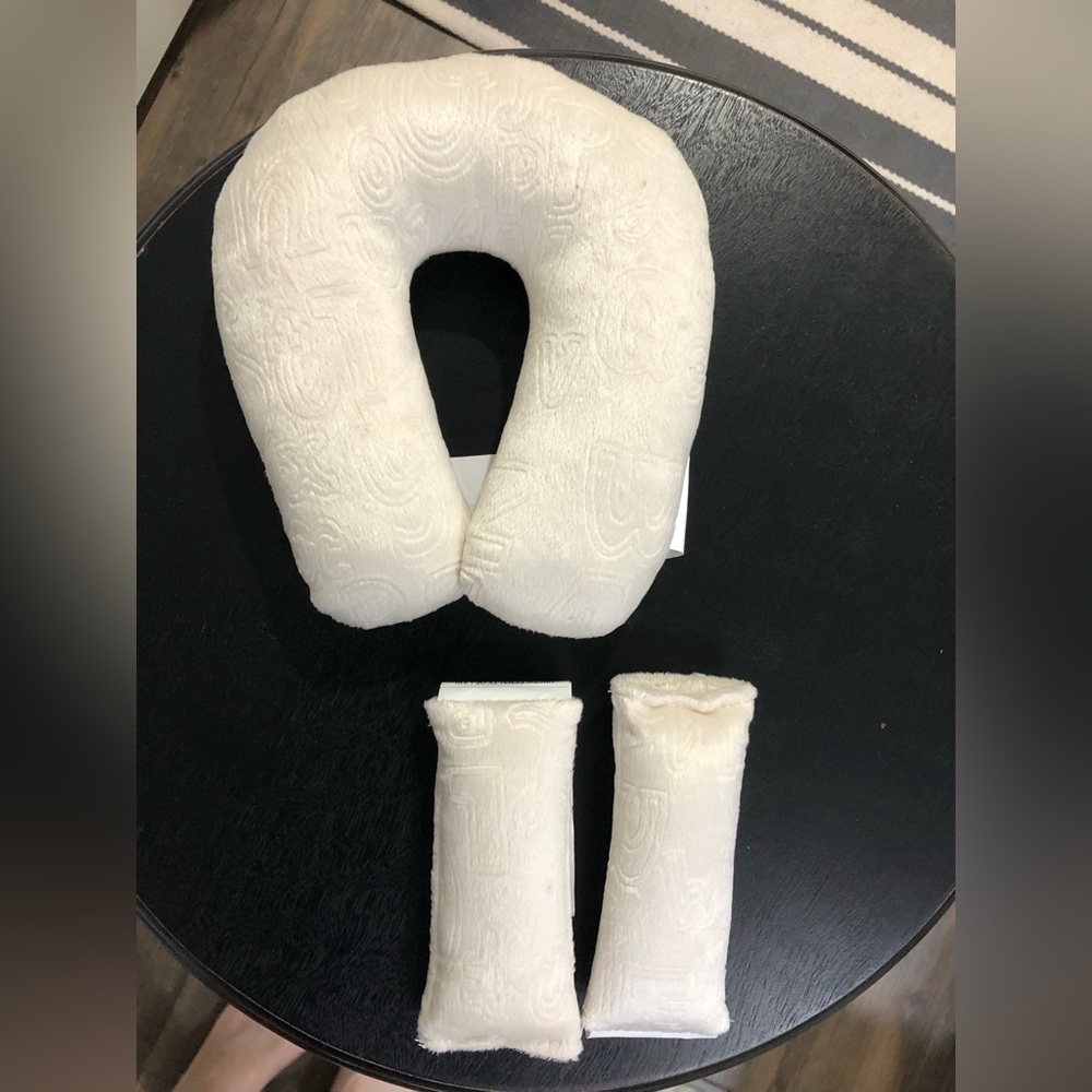 NEVER USED infant car seat strap covers and neck support.